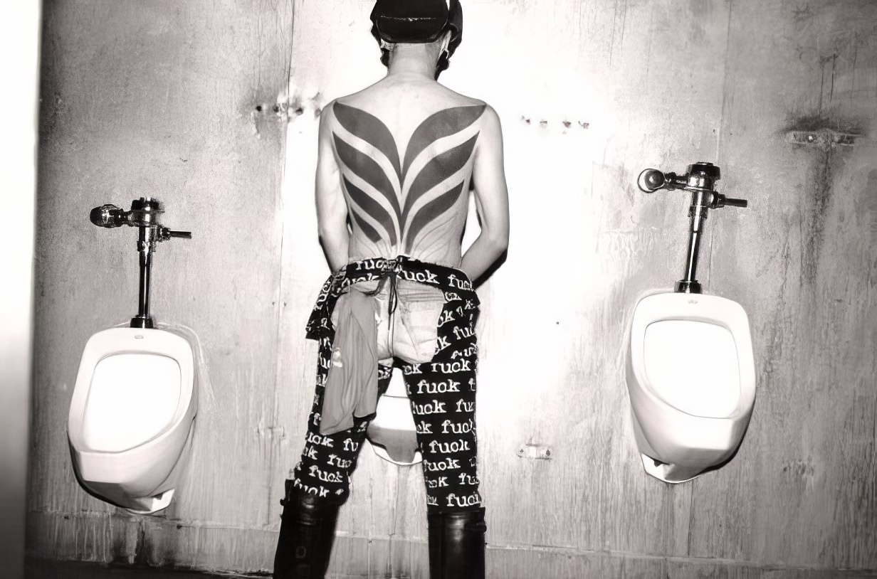 #49 This young man, with five rings in his foreskin, died of AIDS, his wings unfinished.