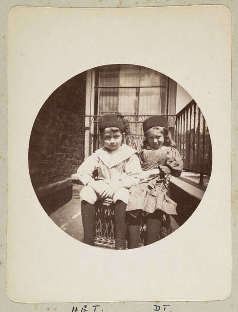 #17 Two children on a balcony