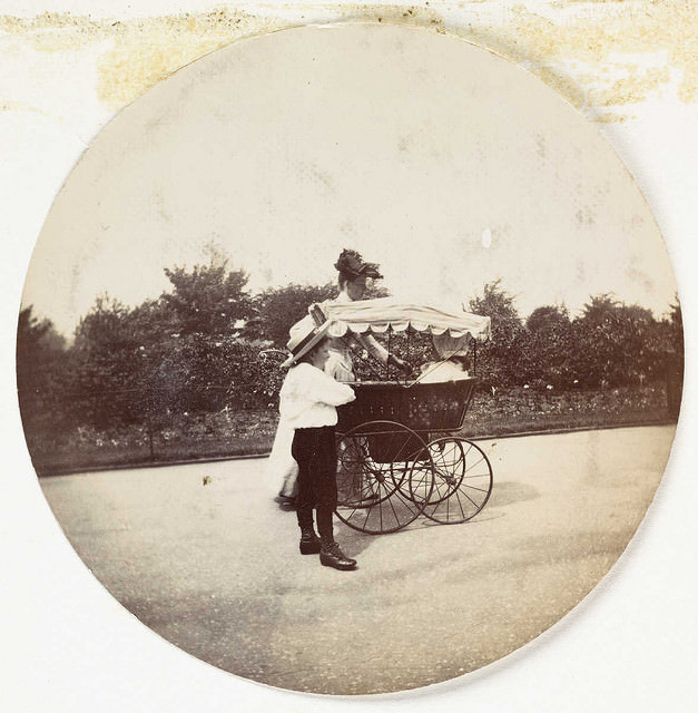 #9 Woman, boy and a pram