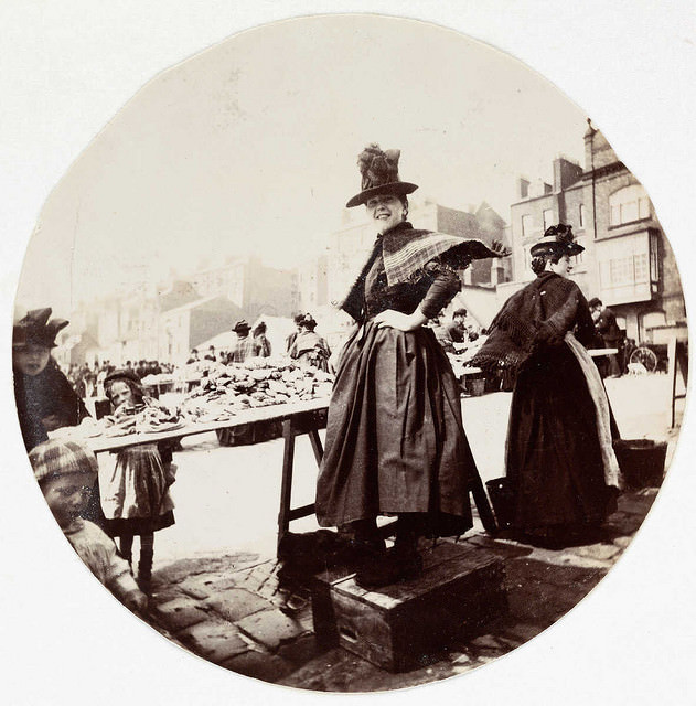 #7 Woman at a market stall
