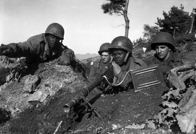 #79 Soldiers from the U.S. 2nd Infantry Division in action near the Ch’ongch’on River, 1950.