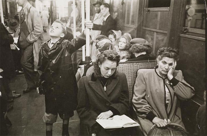 #27 Passengers in a subway car, 1940s.