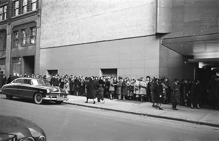 #54 An audience waiting in line to get into a recording of “Grand Slam”.