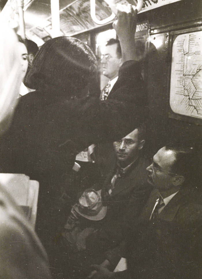 #69 Passengers in a subway car, 1946.