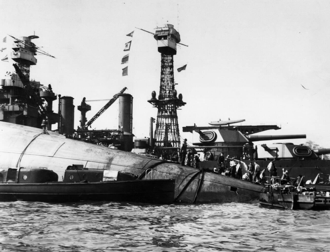 #12 The capsized USS Oklahoma after the Japanese attack on Pearl Harbor, 1941.