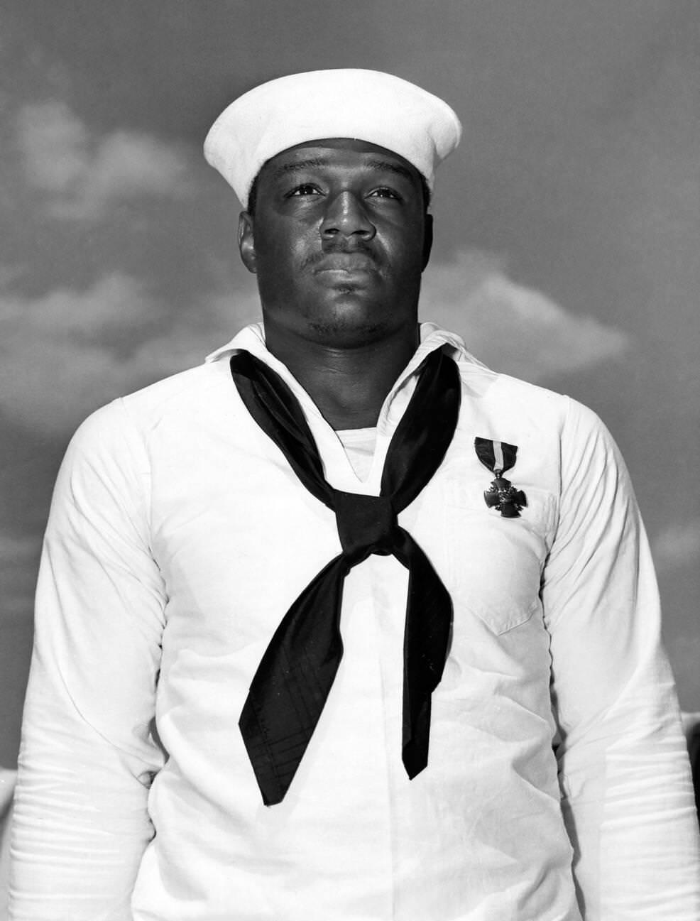 #19 Doris “Dorie” Miller, a Messmen Third Class in the United States Navy noted for his bravery during the attack on Pearl Harbor on December 7, 1941. He was awarded the Navy Cross for his actions, the first black American to receive the award.