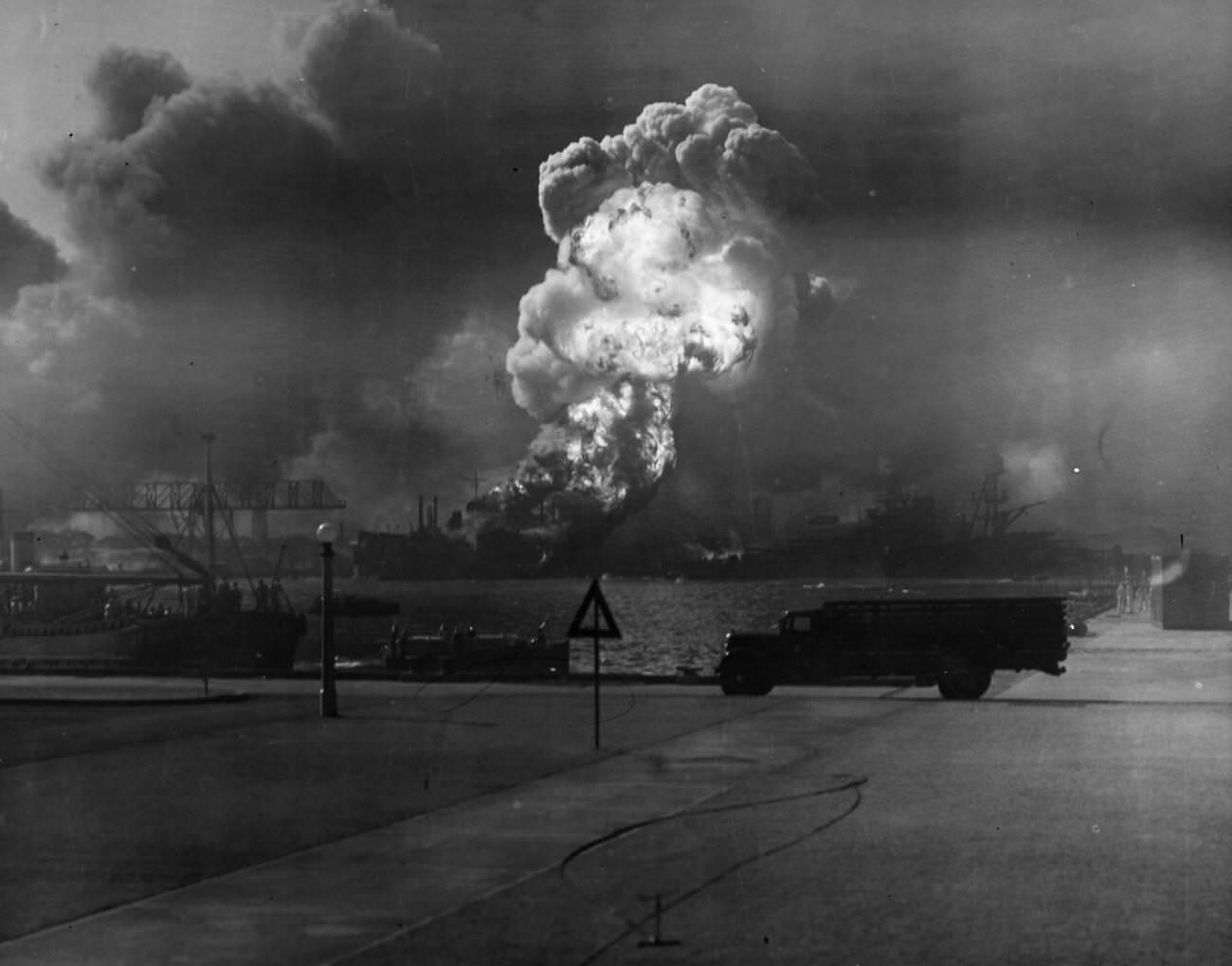 #51 The USS Shaw in flames following the explosion of its magazine during the Japanese attack on the U.S. naval base at Pearl Harbor, Hawaii, 1941.