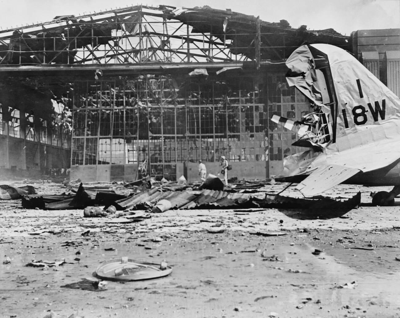 #6 Damaged Hangar No. 11 after the Imperial Japanese Navy Air Service attack, Hickam Field, Pearl Harbor, Hawaii, 1941.