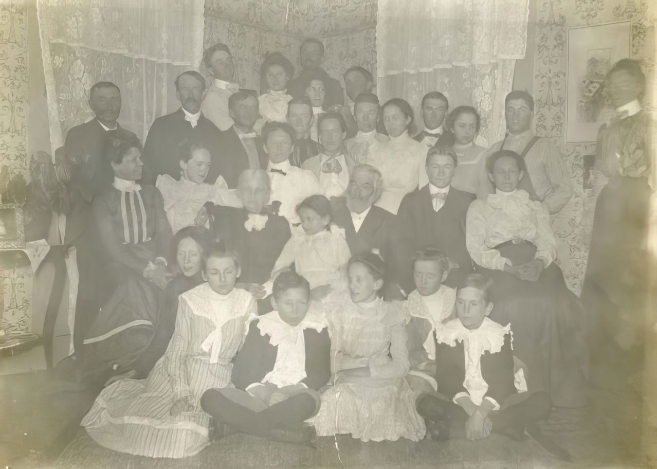 #13 Large family in corner of room