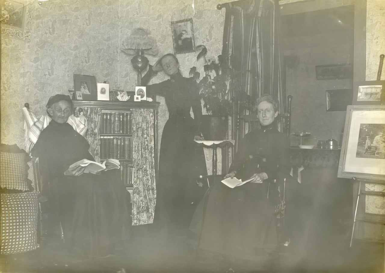 #19 Three women in corner of room