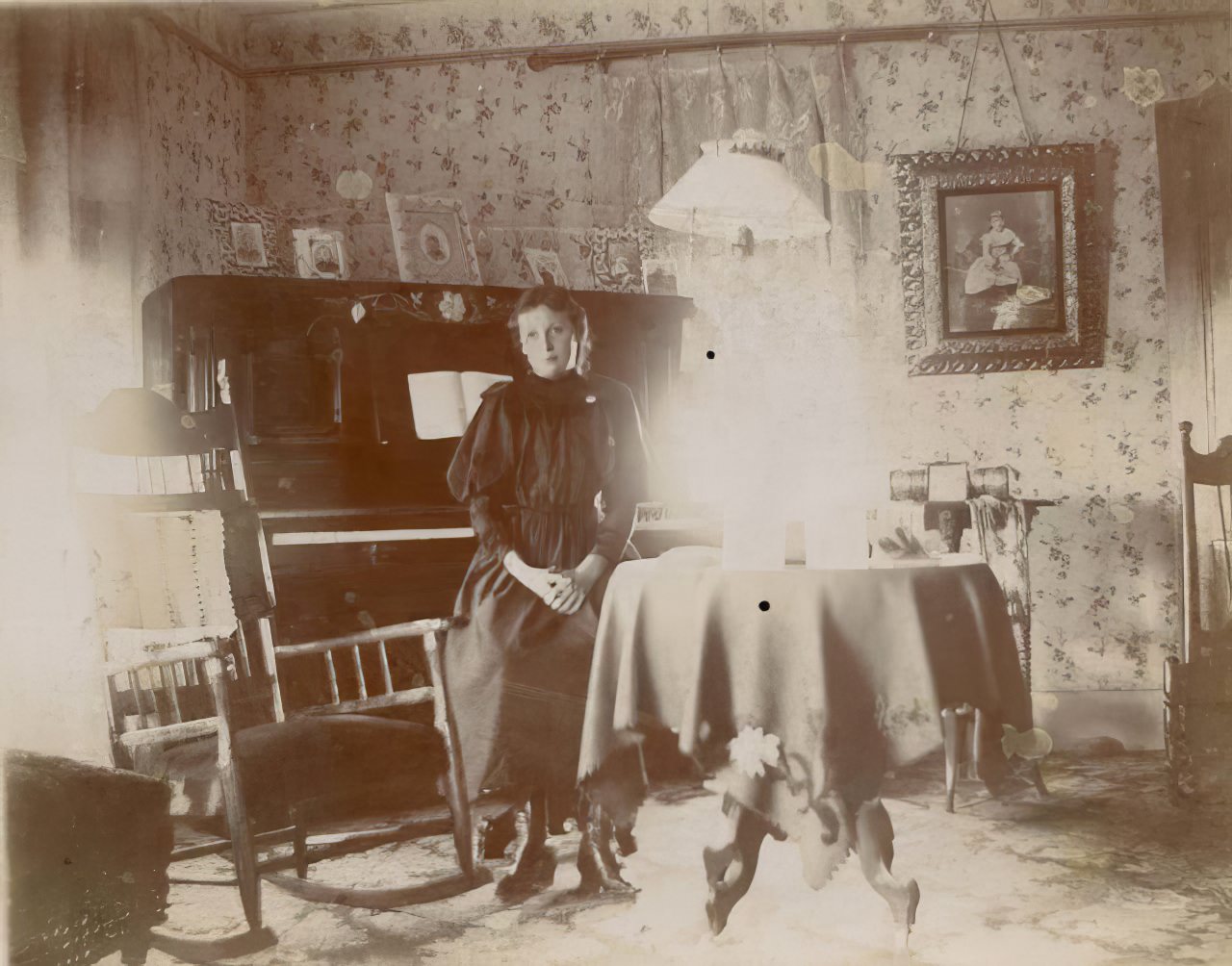 #30 Young woman seated at piano