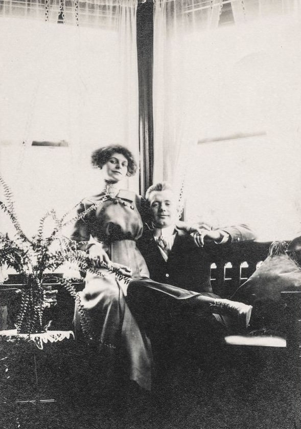 #9 Loving couple sitting in the parlor