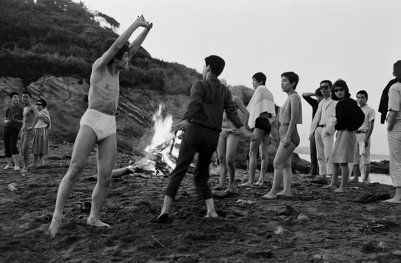 #18 “Naron” and friends at dawn after an all-night party at the beach, 1964.
