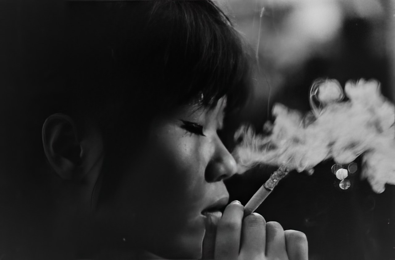 #2 Kako, lost in a world of her own in a jazz shop in Tokyo, 1964.