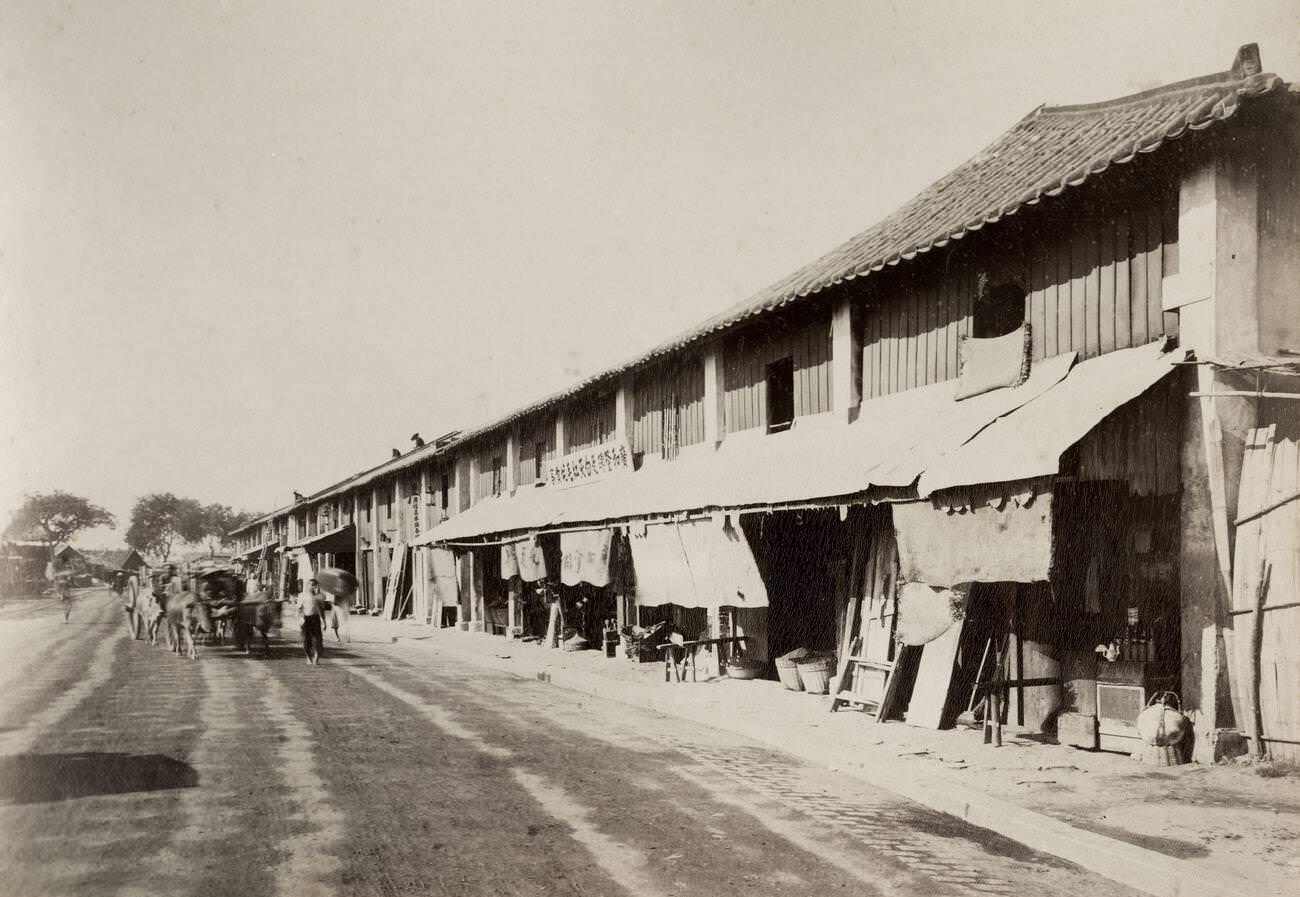 #16 Row of shops in the Cholon district, Saigon, Vietnam, 1800s.