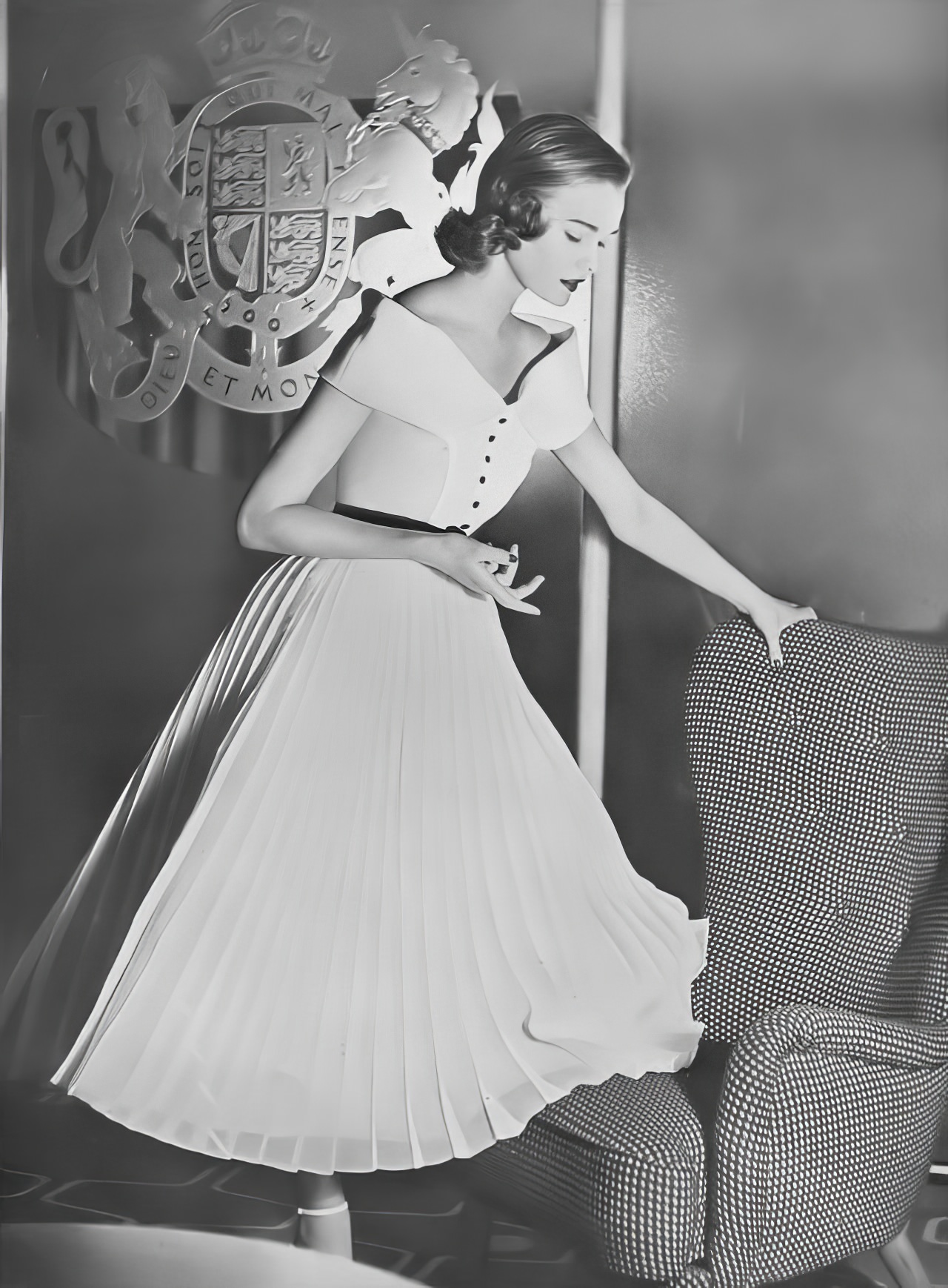 #13 Susan Abraham in a pleated white organza evening dress, 1952.