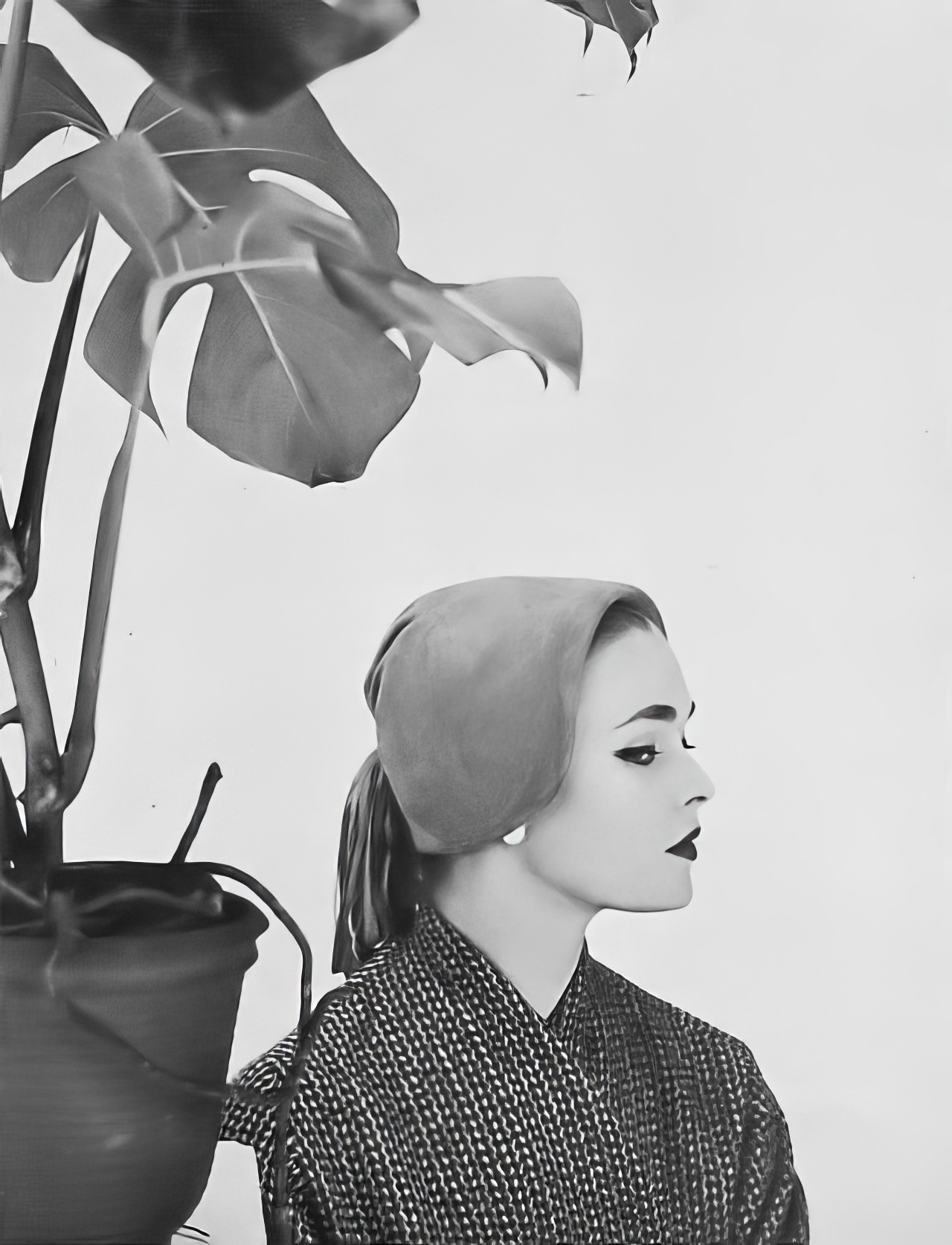 #15 Susan Abraham wearing a mustard-colored suede cap, 1952.