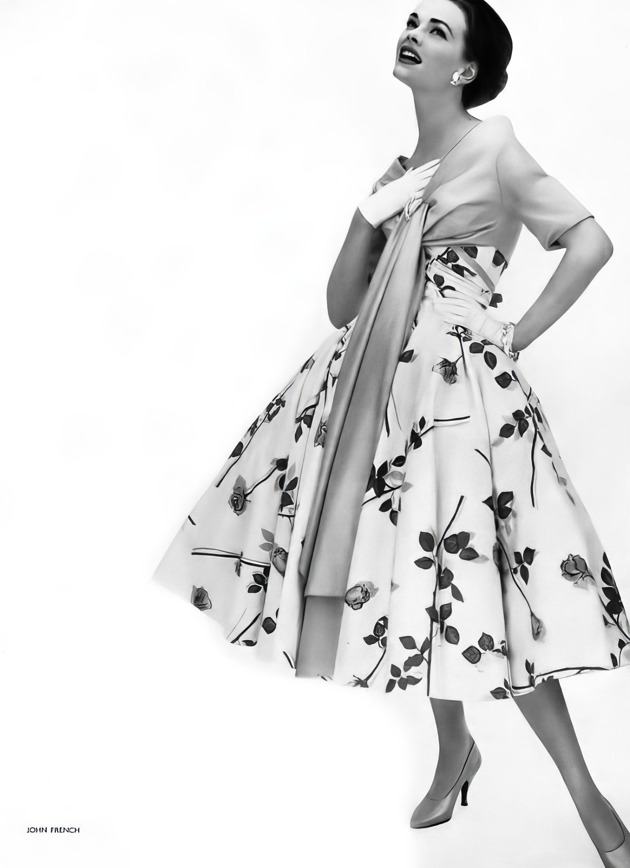 #39 Susan Abraham in a short evening dress of cotton, 1957.