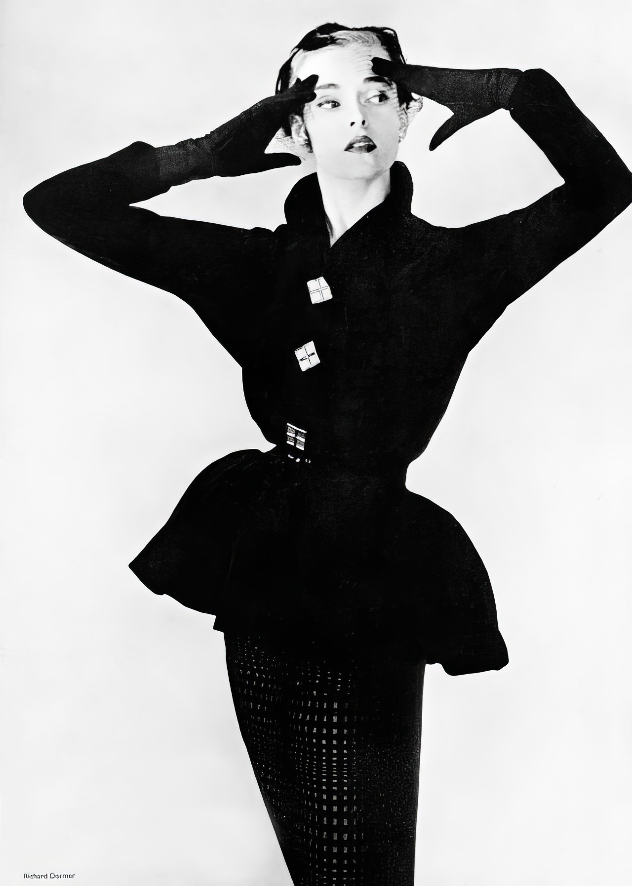 #4 Susan Abraham in a cocktail suit with a lampshade jacket and self-checked black velvet skirt, 1951.
