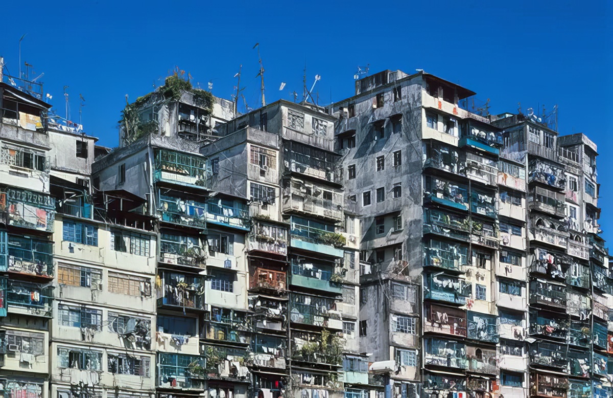 #10 Crowded balconies in Kowloon Walled City.