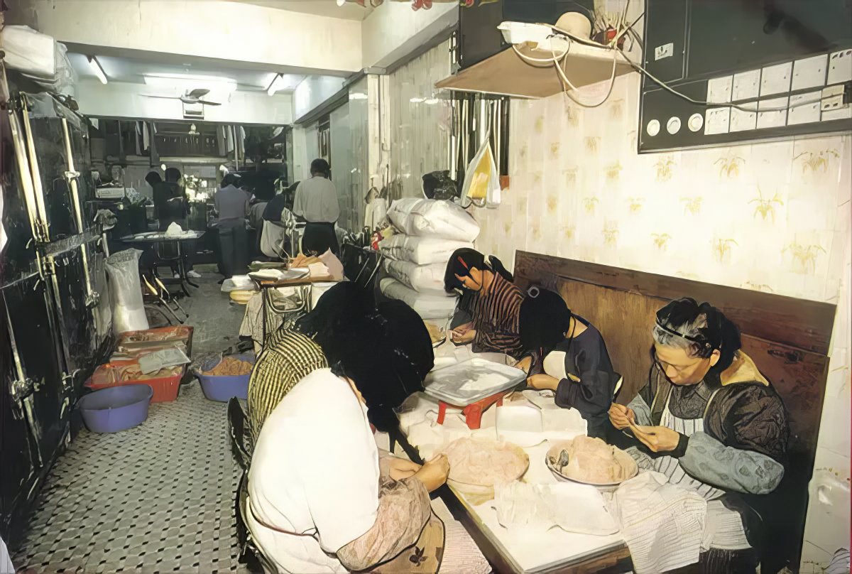 #13 People working in a restaurant on the Kowloon Walled City.