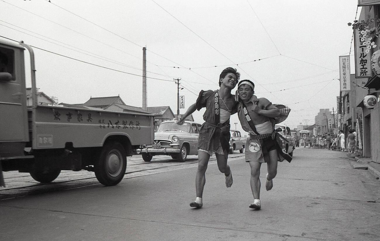#19 Two young men in happy coats at a matsuri in Tengenji, Tokyo, 1958.