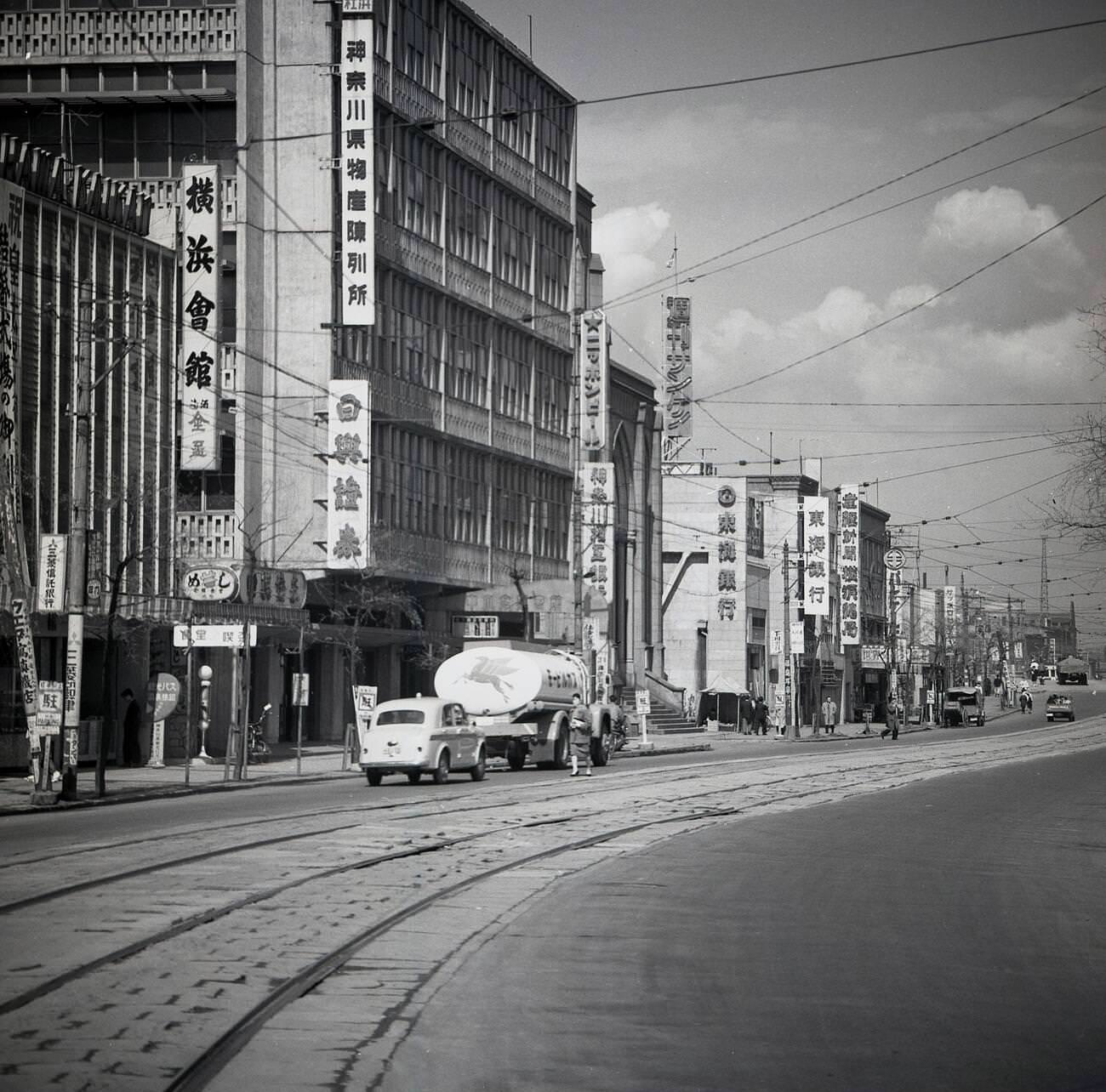 #46 Tram-lines in the road in the old town area of Tokyo, 1950s.