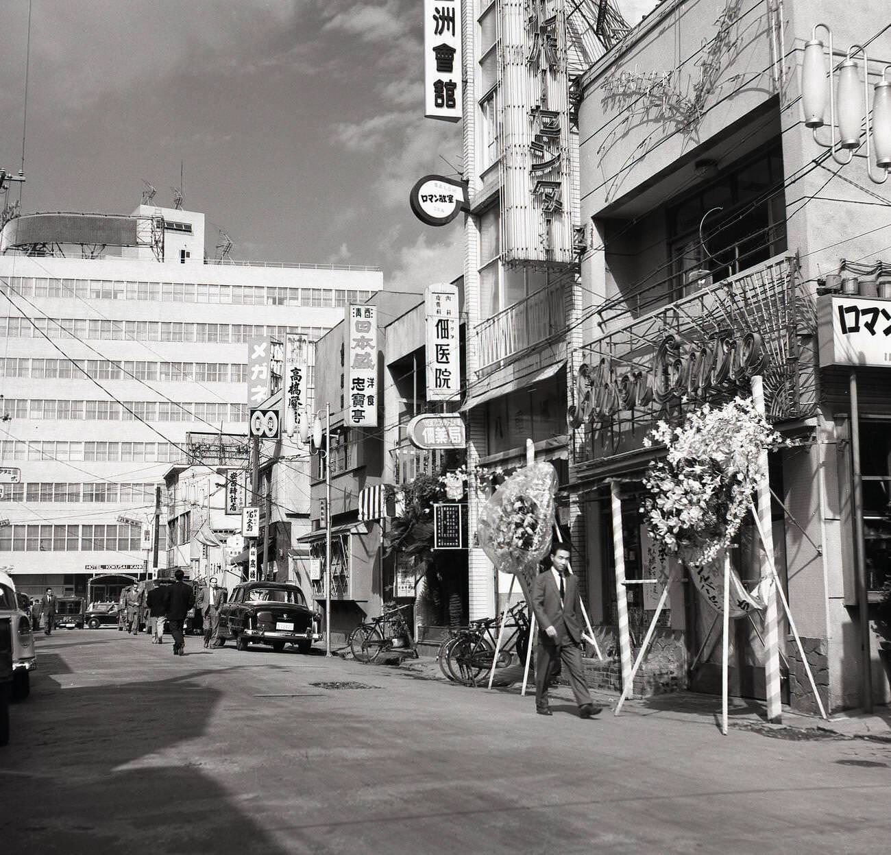 #55 A ground level retail stores in the old town of Tokyo, 1950s.