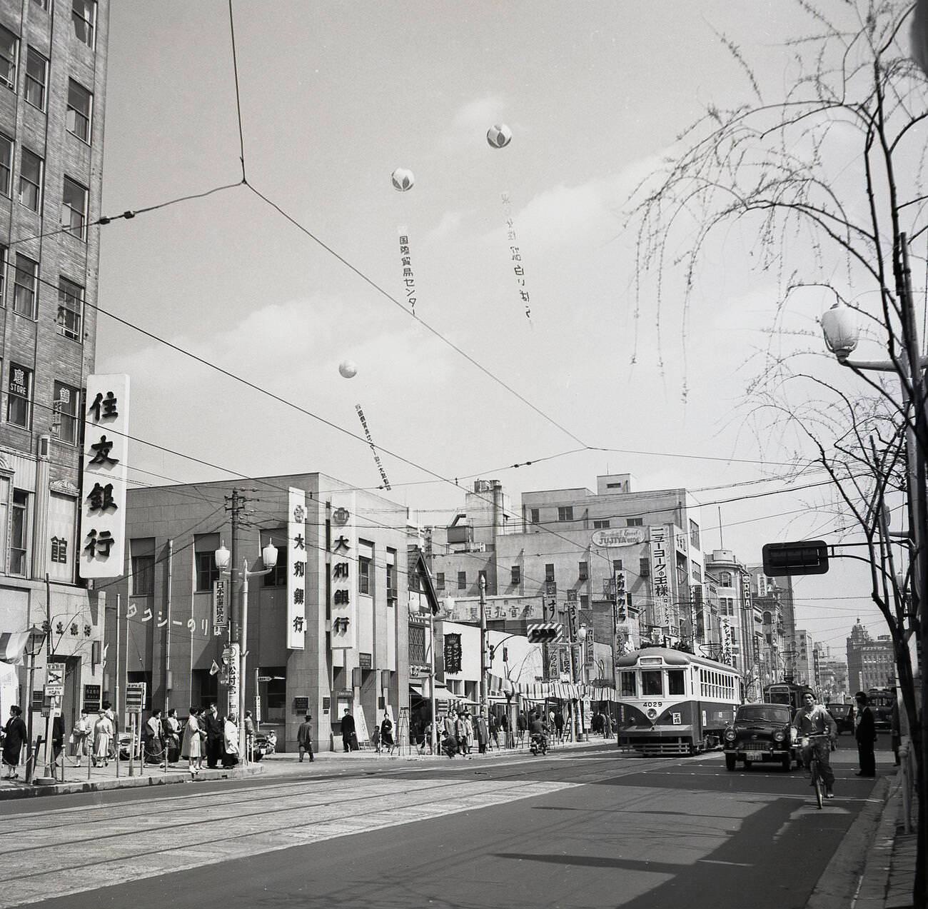 #83 A street in the old town, Tokyo, 1950s.