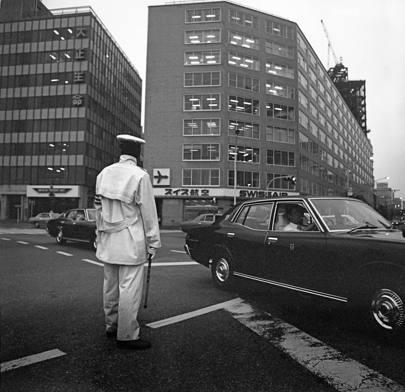 #12 Policeman, Traffic controller, Tokyo, 1978.