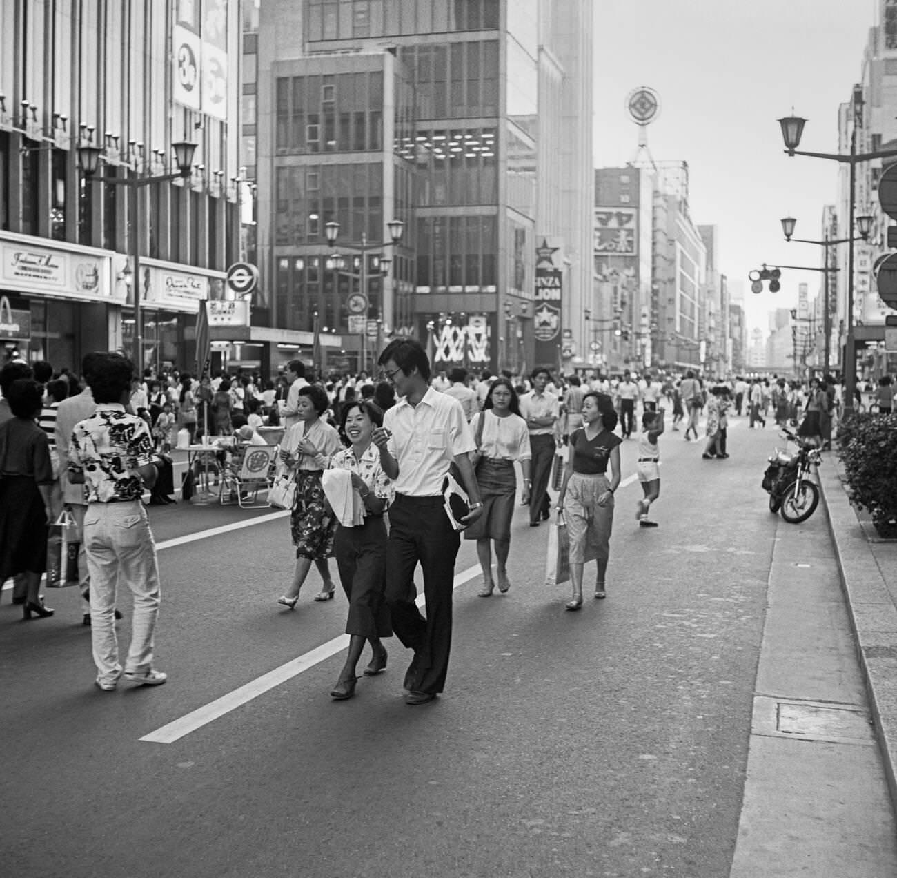 #126 People walk down the street, Tokyo, 1978.
