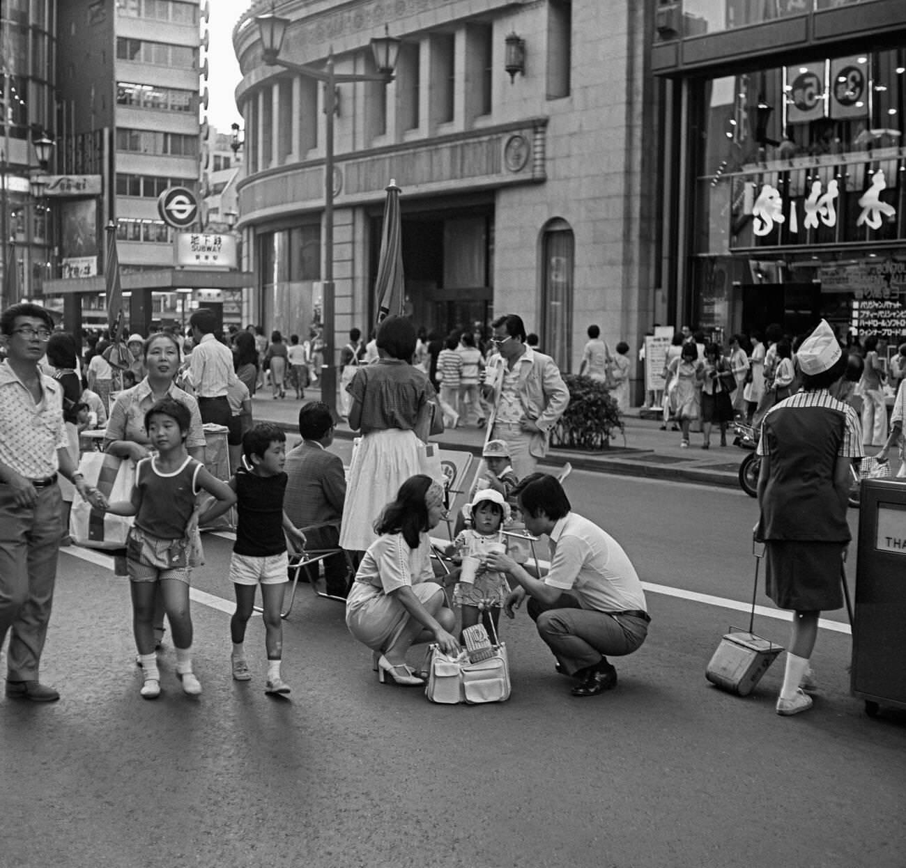 #69 People walk down the street, Tokyo, 1978.