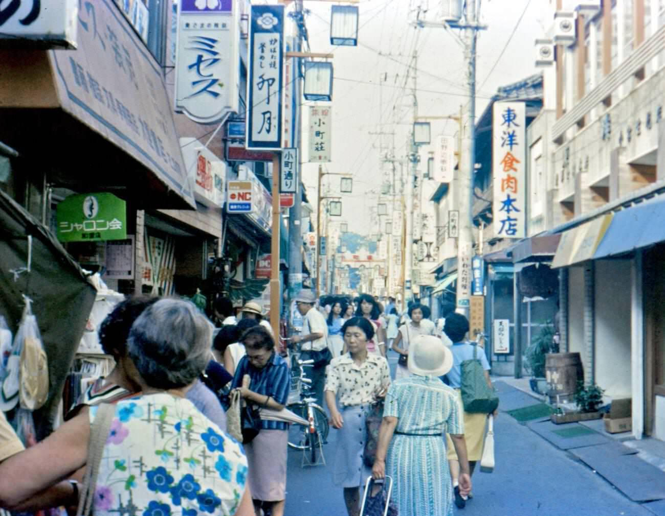 #78 Shoppers at the Ginza Shopping Center in Tokyo, 1976.
