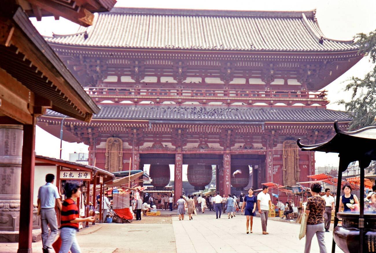 #96 Visitors walk through the gate to the Kannon Temple and Shrine in Tokyo, 1973.