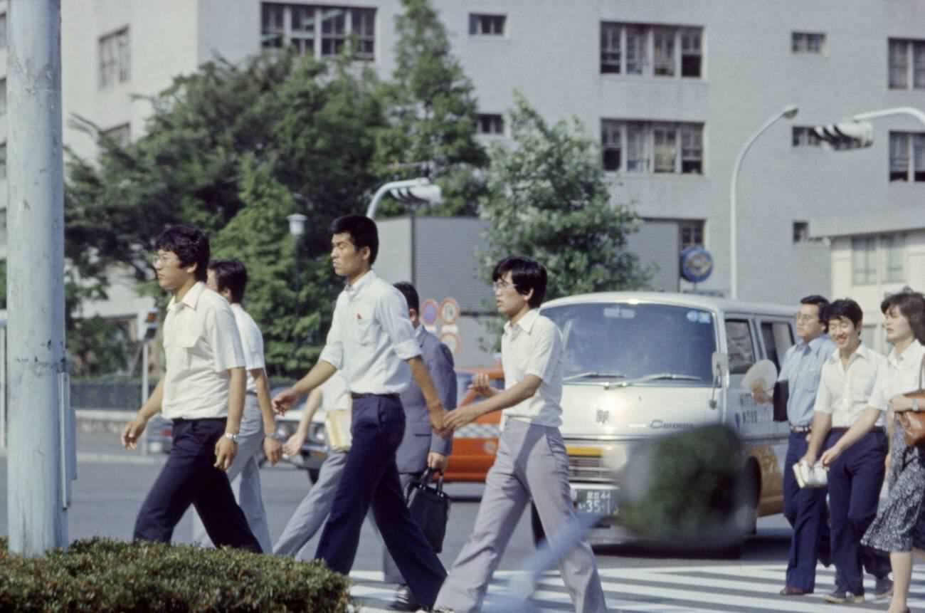 #120 People cross the street, Tokyo, 1970s.