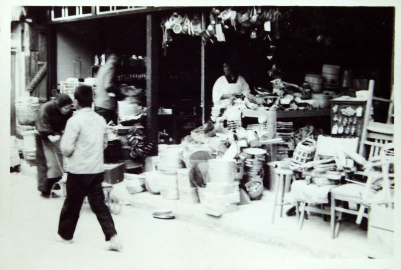 #23 Local hardware store at a market, 1940s.