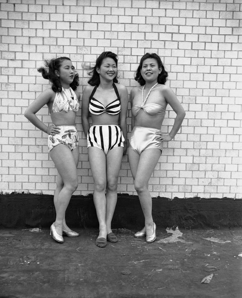 Three dancing girls at the Imperial Theater in Tokyo model new 1946 style Japanese bathing suits, known as “Democratic suits,” 1946.