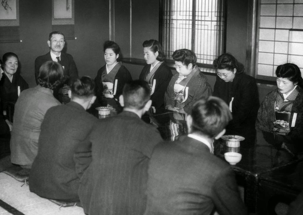 #68 Eight girls and four men met with matrimony as the object at the Myogetsu-En, behind the Ueno Art Museum in Tokyo, 1947.