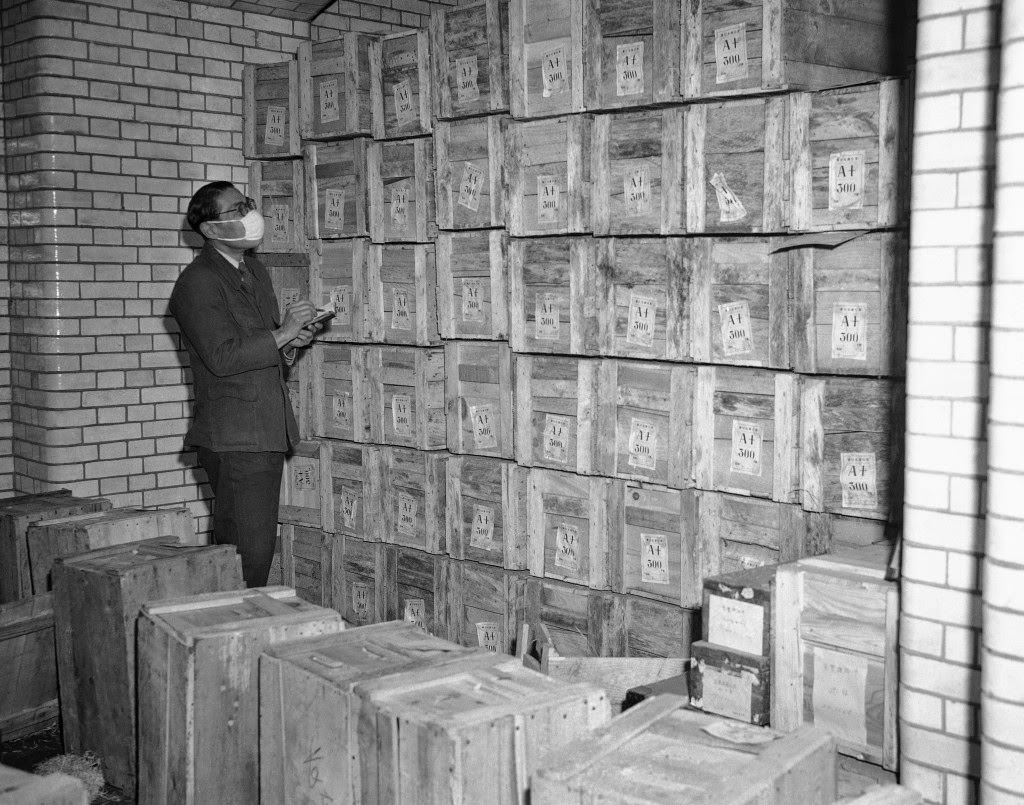 #97 View inside the vaults in the Bank of Japan in Tokyo, 1947, as new yen is stored in boxes until called into circulation by the government.