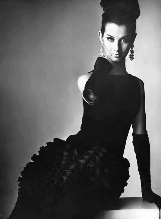 #9 Veronica Hamel in a black crepe and organdie dress, 1964.
