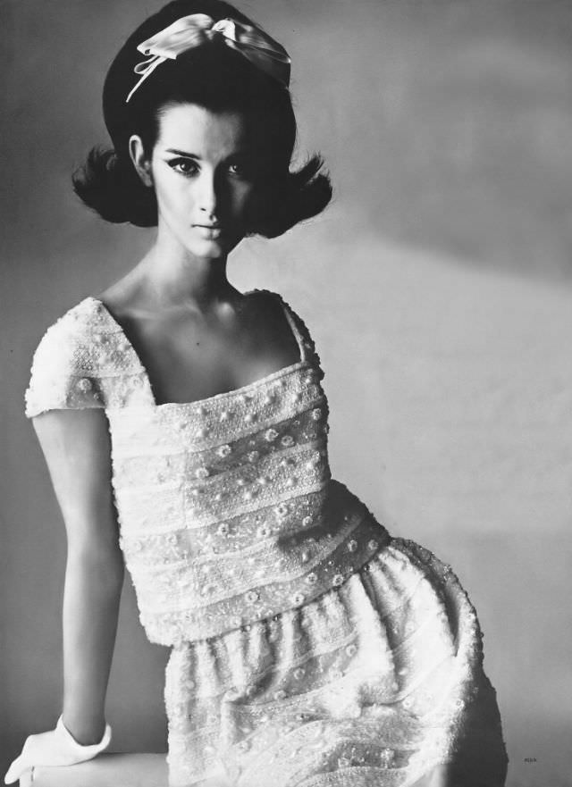 #10 Veronica Hamel in a charming dress of thin white silk organdy, 1964.