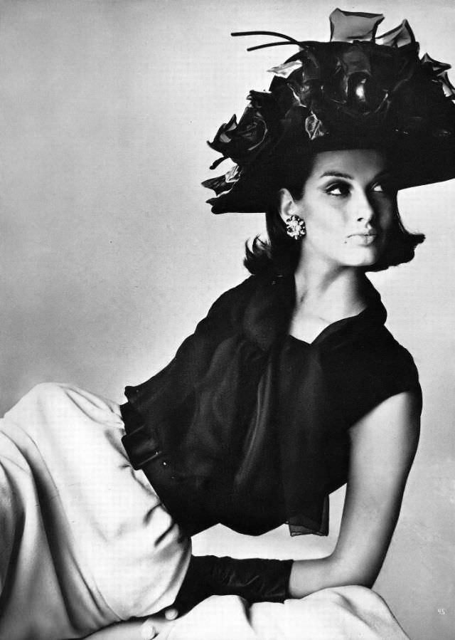 #16 Veronica Hamel in a suit of pale ivory silk crepe, 1964.