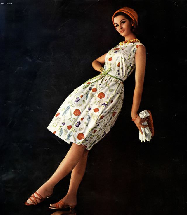 #22 Veronica Hamel in a charming dress by Dorothy Cox, 1965.