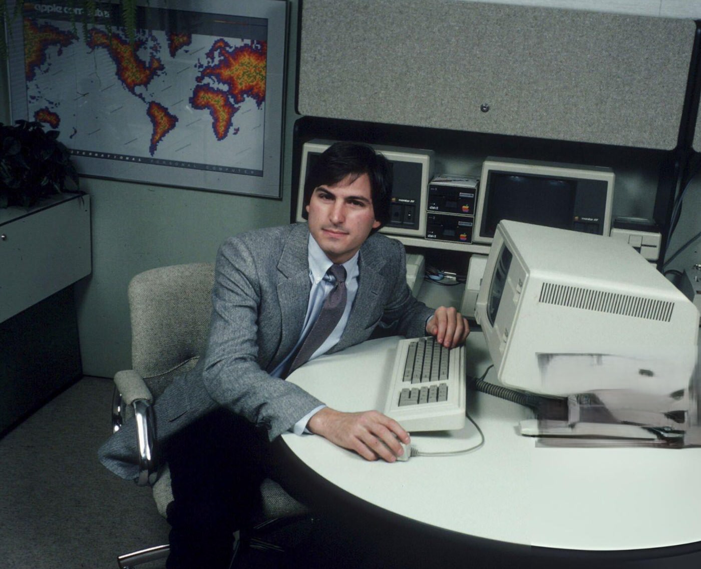 #19 Steve Jobs sitting with the “Lisa” Computer, 1982.