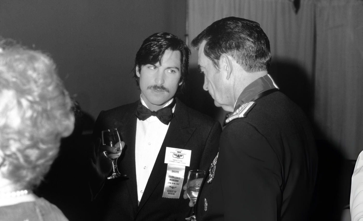 #25 Steve Jobs chats with a general at the Academy of Achievement Golden Plate Awards, 1982.