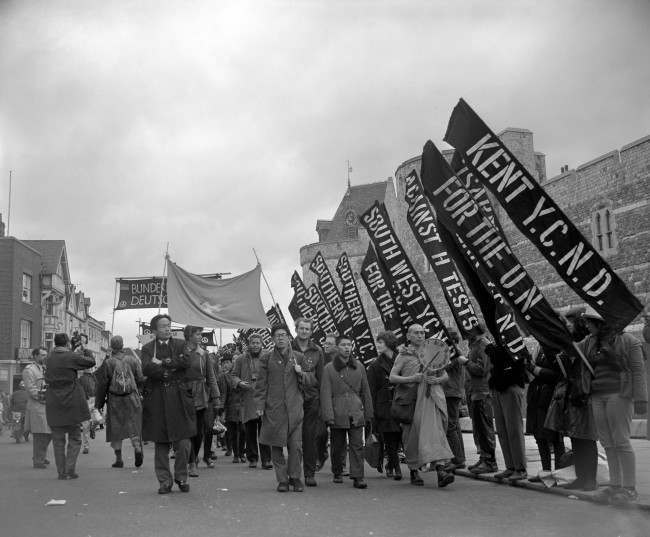 #33 A group of campaign marchers from Hiroshima, Japan, pass Windsor Castle, 1963.