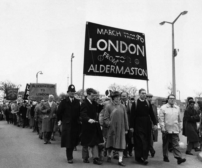 #5 Demonstrators start out on the 54-mile “Ban-the-Bomb” protest march from Aldermaston, England, to London, 1960.