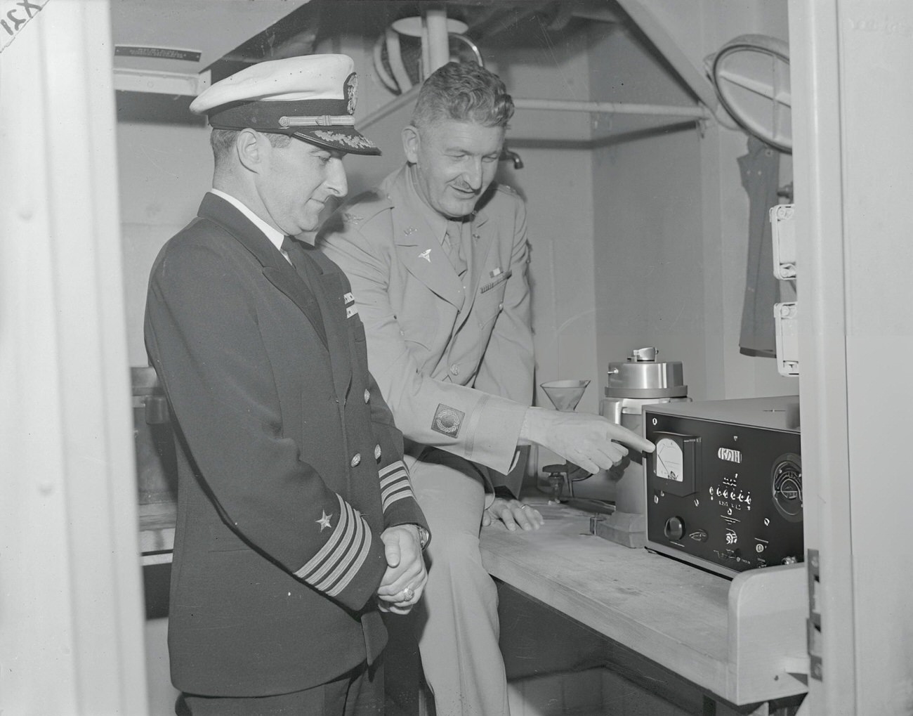 #6 A Geiger-counter is shown aboard the USS Haven, preparing to sail from San Francisco Bay for Operation Crossroads, 1946.