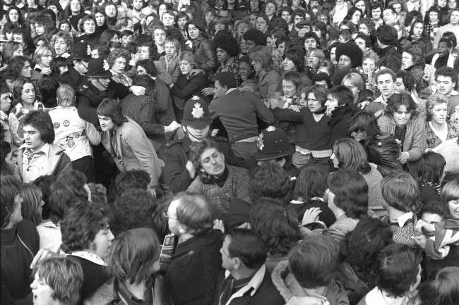 Police try to control the crowd at Highbury before Arsenal’s match against Manchester United, 1970s.