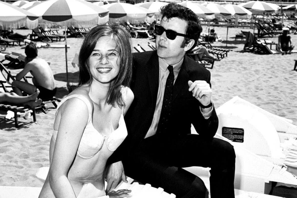 #7 Ray Brooks and Charlotte Rampling on the beach in Cannes, 1965.